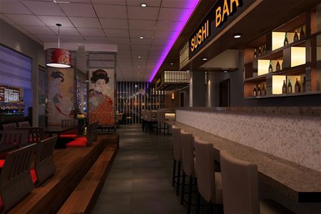 Interiörbild, skylt sushi bar, stolar vid baren, flaskor på glashyllor, låga stolar.