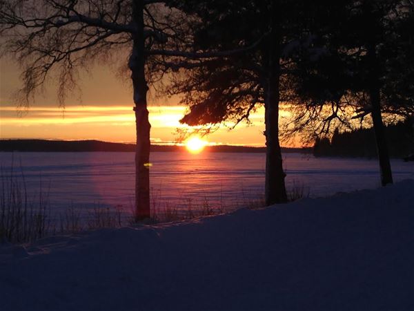  Sunset by the frozen lake. 