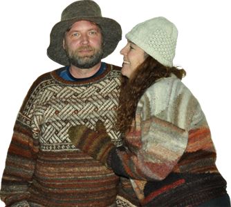Couple wearing knitted wool sweaters.