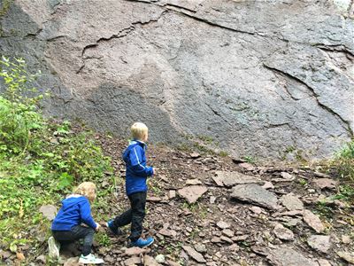 Two children looking at the cliffs.