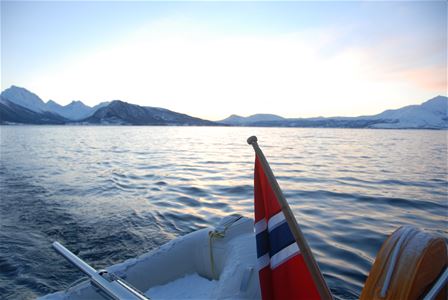 View from boat and snowcovered landscape