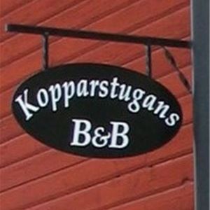 Black sign Kopparstugans B & B