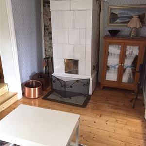 Room with tiled stove