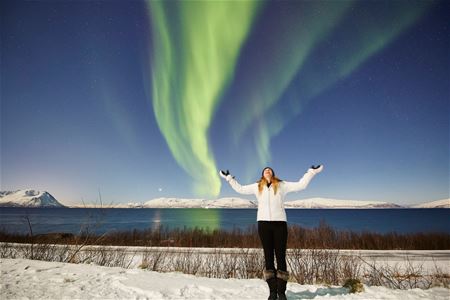 Posing under northern lights