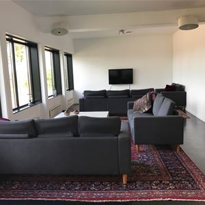 Room with sofa's and tv.