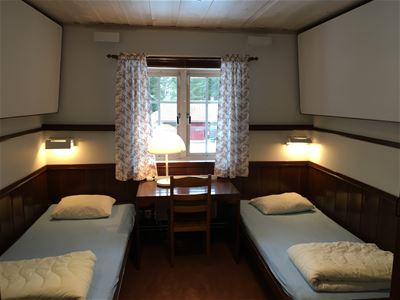 Room with beds.
