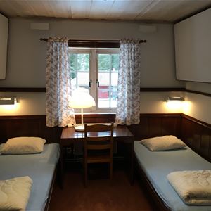 Room with beds.