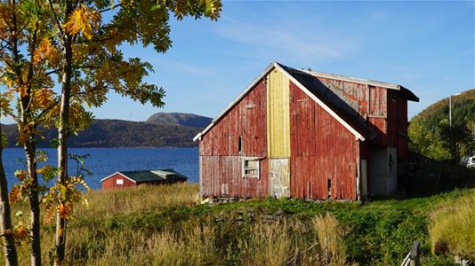 Old building in fjordlandscape