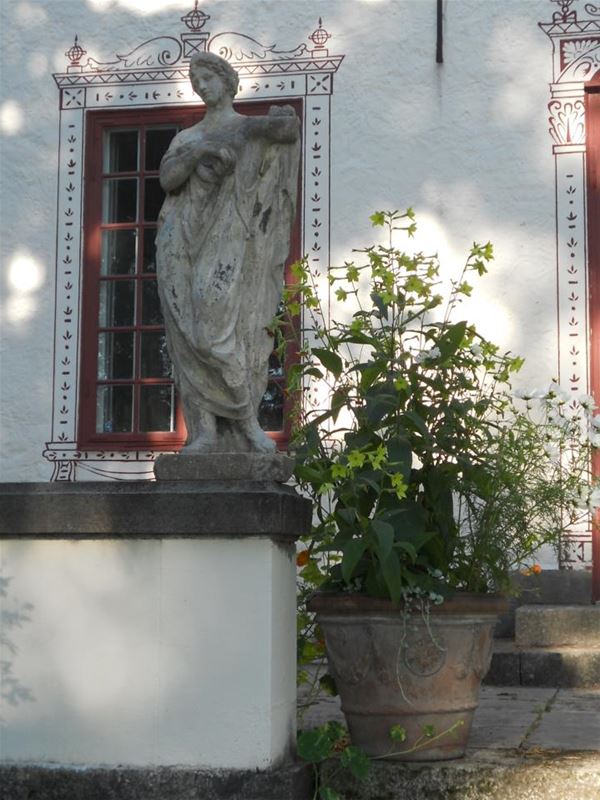 Statue outside the house.