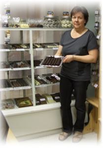 The owner shows pralines.