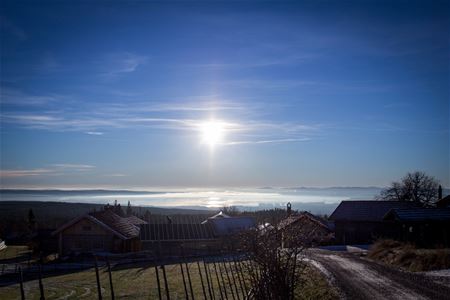 View over Fryksås with  the sun shining from a clear blue sky.