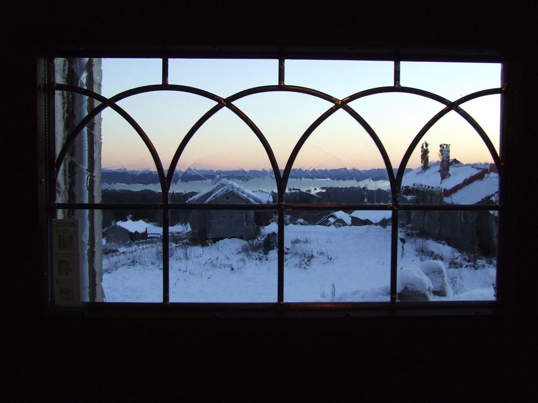 View over Fryksås through leaded windows. 