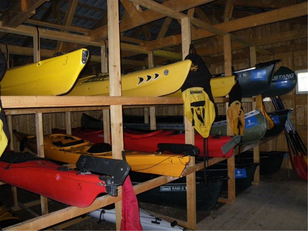 kayaks storage in a barn.