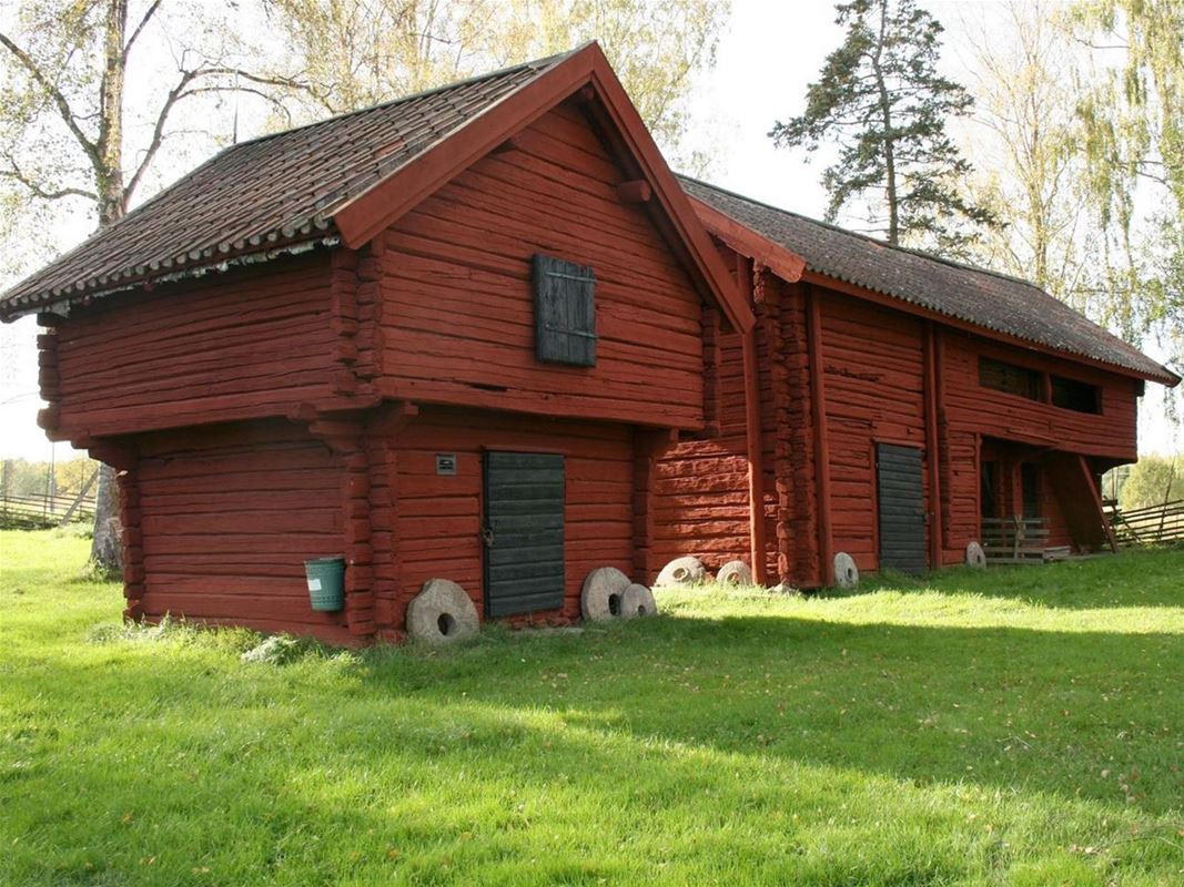 A red log house.