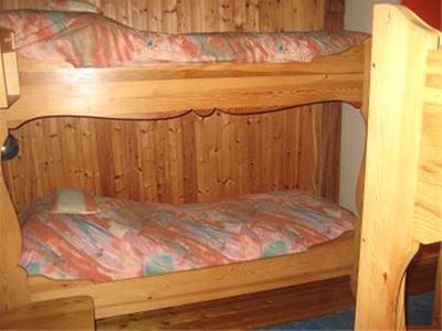 Room with two bunk beds.