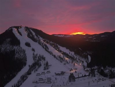 The slopes at the Gesunda mountain in the sunset.