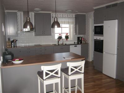 Kitchen with and kitchen island.