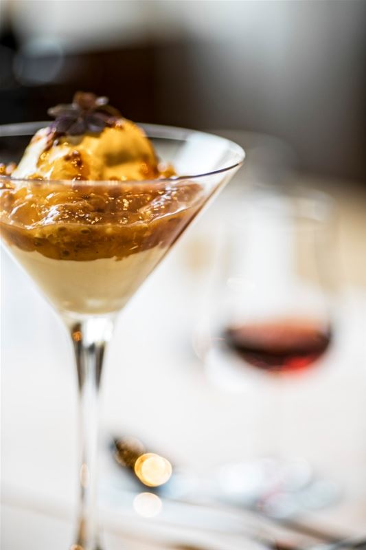 A dessert in a cocktail glas.