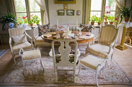 A bright room with bright furniture in old style.