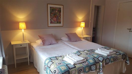 Room with double bed.