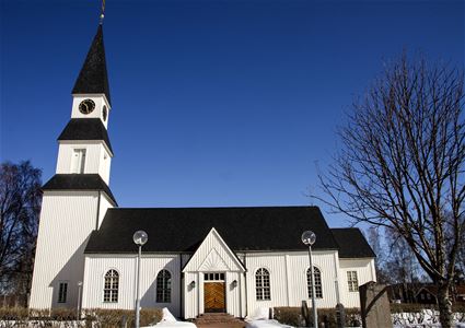 Särna new church in wintertime with a blue sky