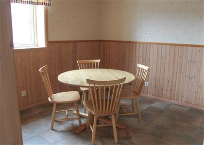 Small table with four chairs.