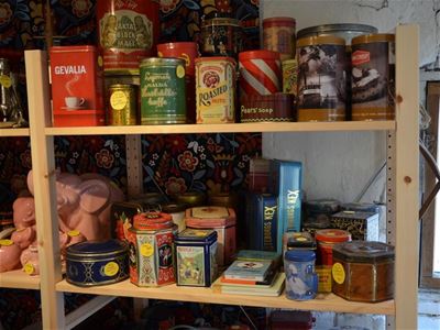  Shelves with old tin cans.