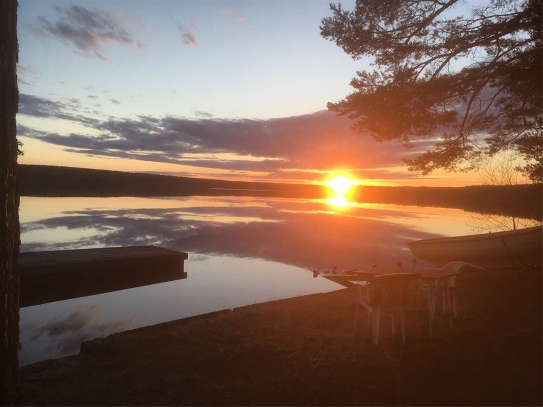 Sun goes down by the lake Siljan.