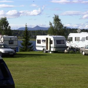 Trailers parked at the campsite.