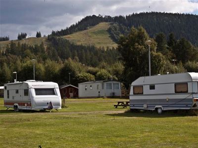 Two caravans on the camping area.
