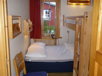 Bedroom with two beds.