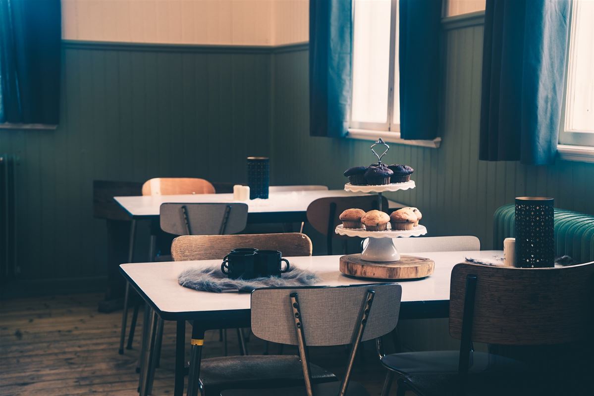 Room with dining tables.