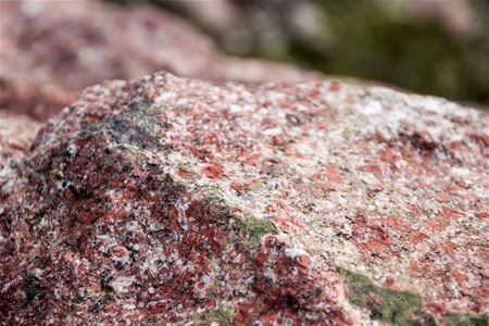 A red small rock in a quarry