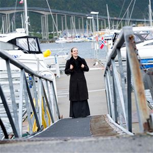 Person standing ona  dock