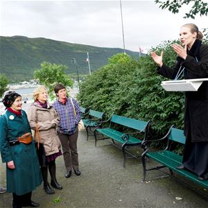 Enthusiastic guide explaining