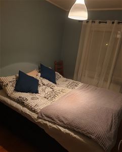 Room with a double bed.