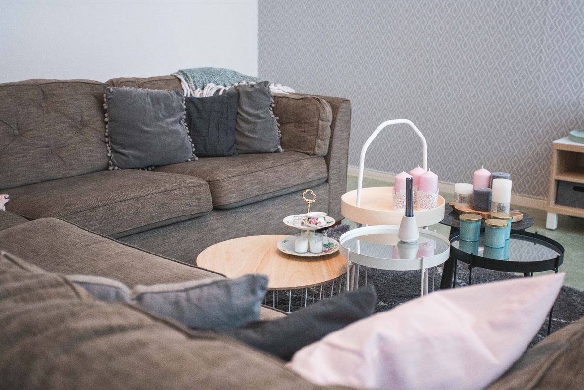 Living room with a large sofa.