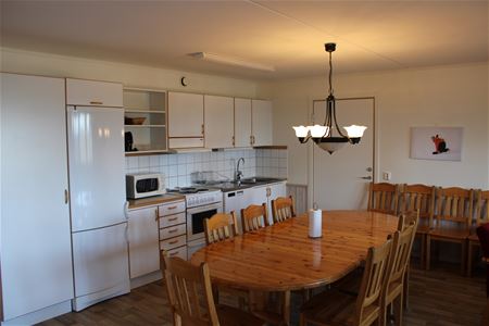 Kitchen area with a dining table.