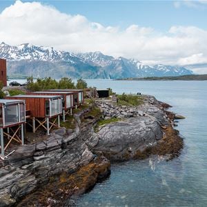  © Lyngen Resort, arial view of cabins at water's edge