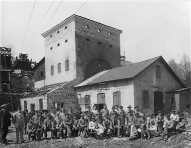 Old picture showing the workers outside the factory.