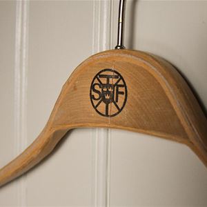 A hanger on a door.