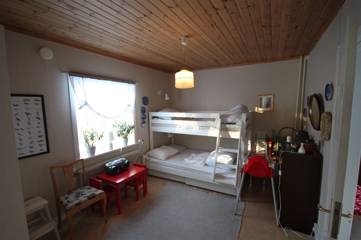 Bedroom with a bunk bed on the lower floor.