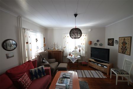 Room with a TV and a Sofa.