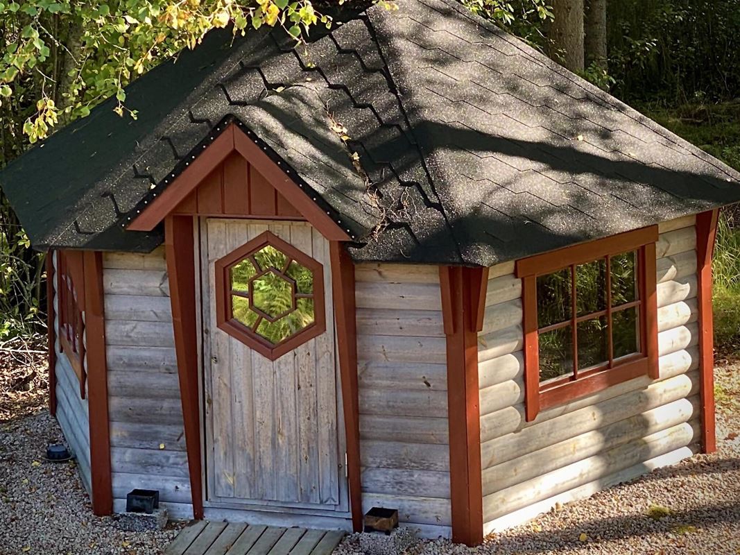 Small log house.