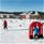Children in startposition of skislope atRomme Alpin Ski lodge, Hotel and restaurante.