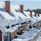 Cottages covered in snow.