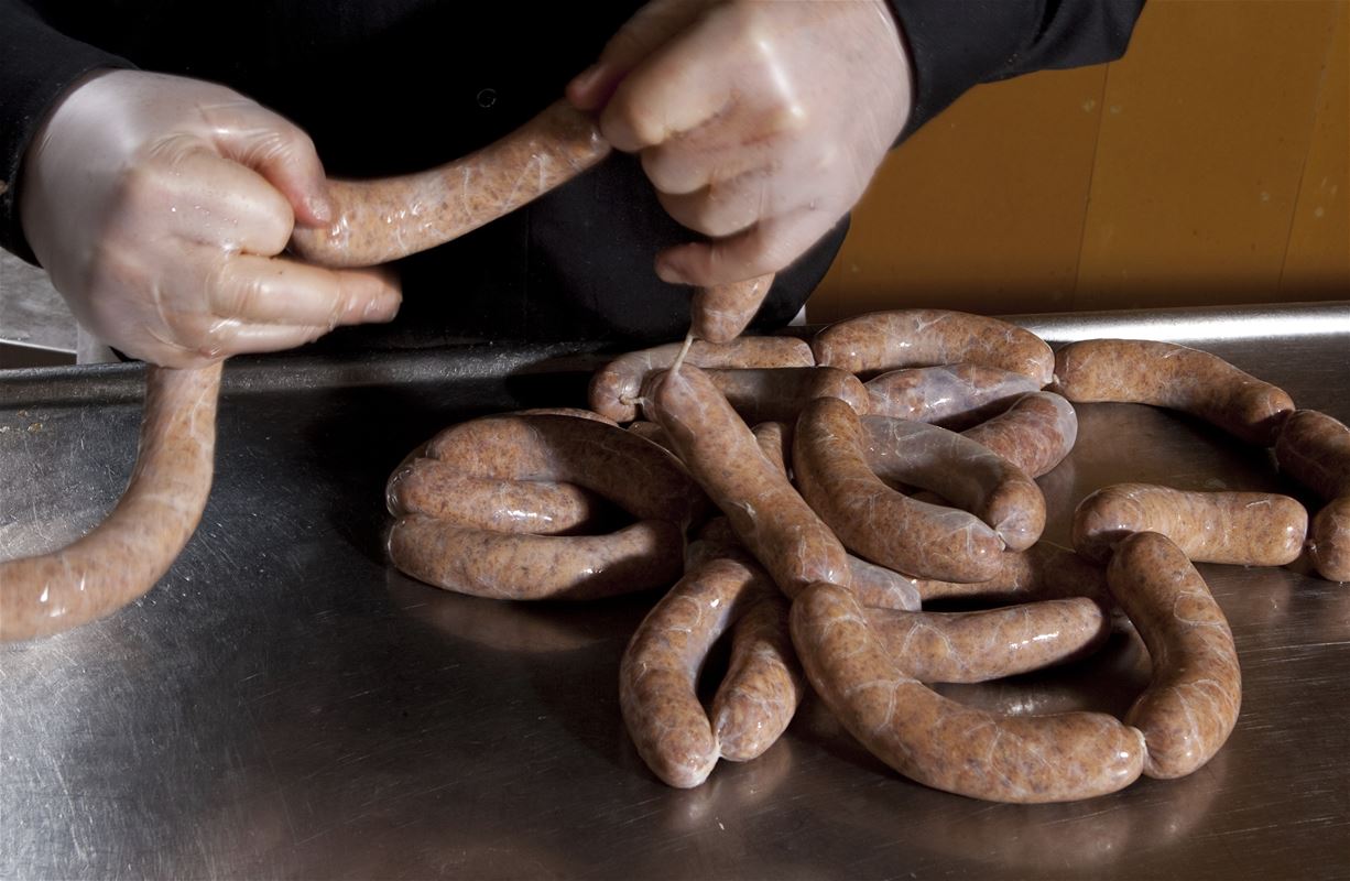 Making sausages.