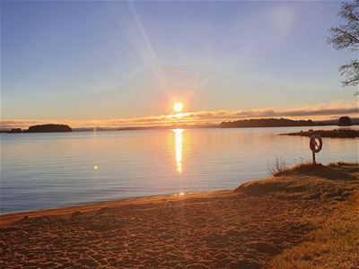 Solnedgång vid Åmåsängsbadet.