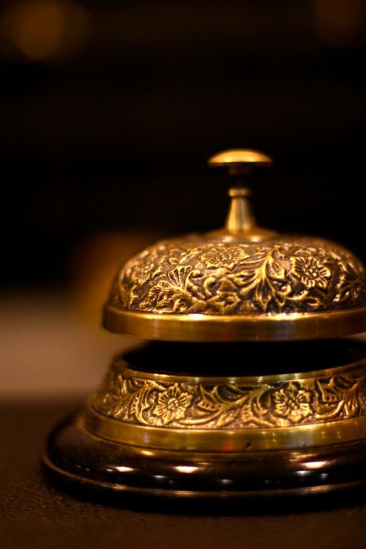 A bell on the reception desk.