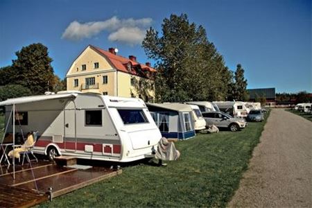 Caravans outside of the house.